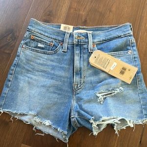 High-rose Levi shorts size 27